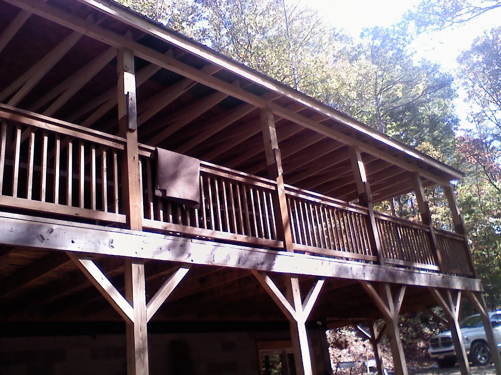 Timber framing under a new elevated porch and deck — Roof Leak Repair in Oakesdale by Roofing Brothers